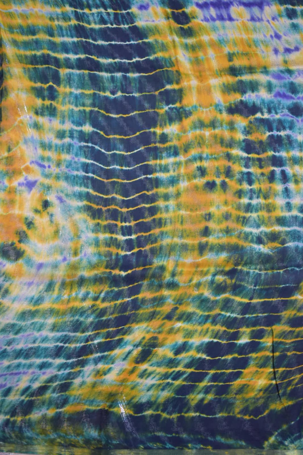 ORANGE-GEORGETTE SAREER WITH SHIOBORI TIE & DIE