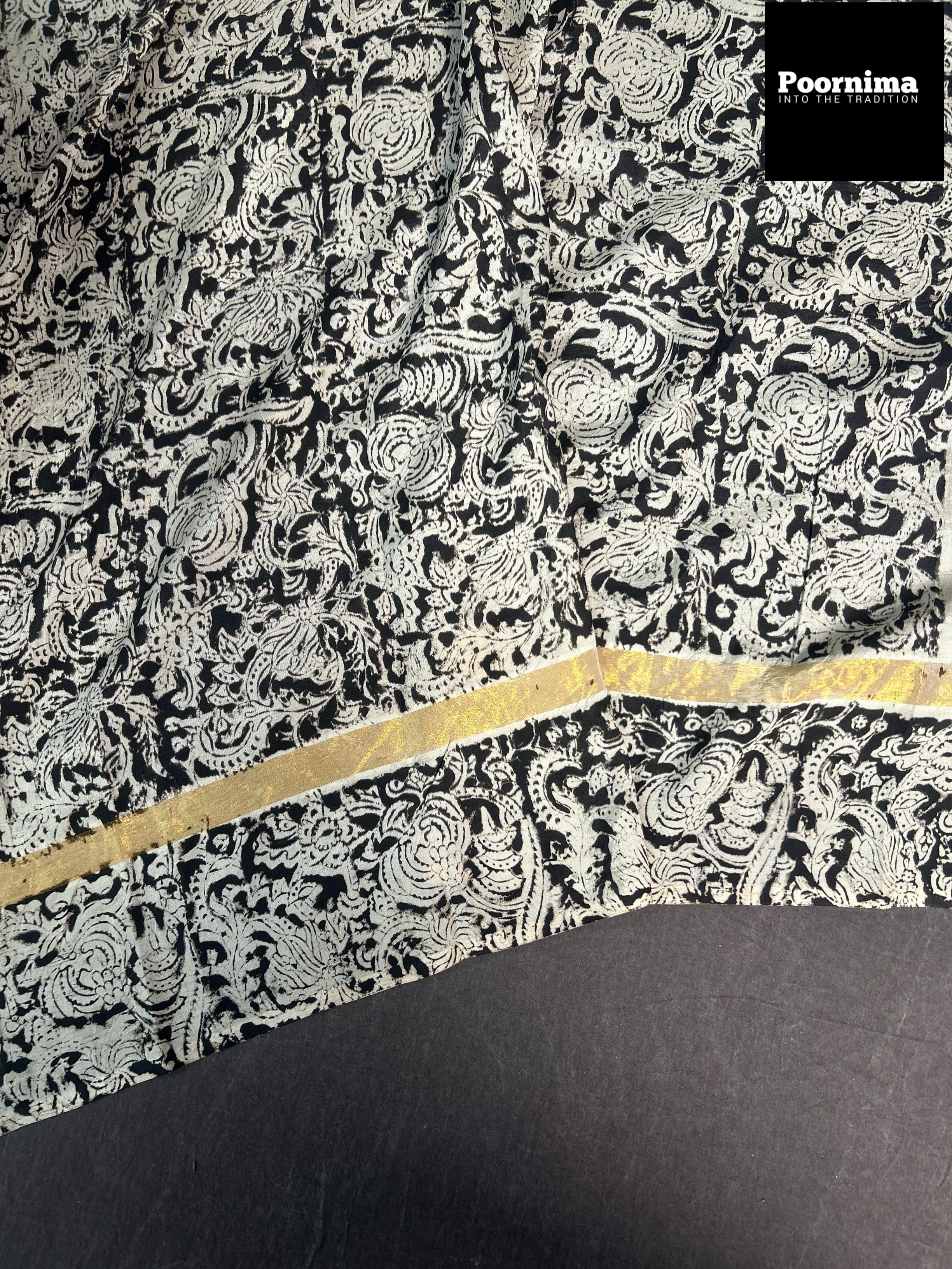 GAJI SILK WITH SMALL GOLD BORDER WITH BLACK AND BLUE COMBINATION WITH CREAM COLOUR BODY