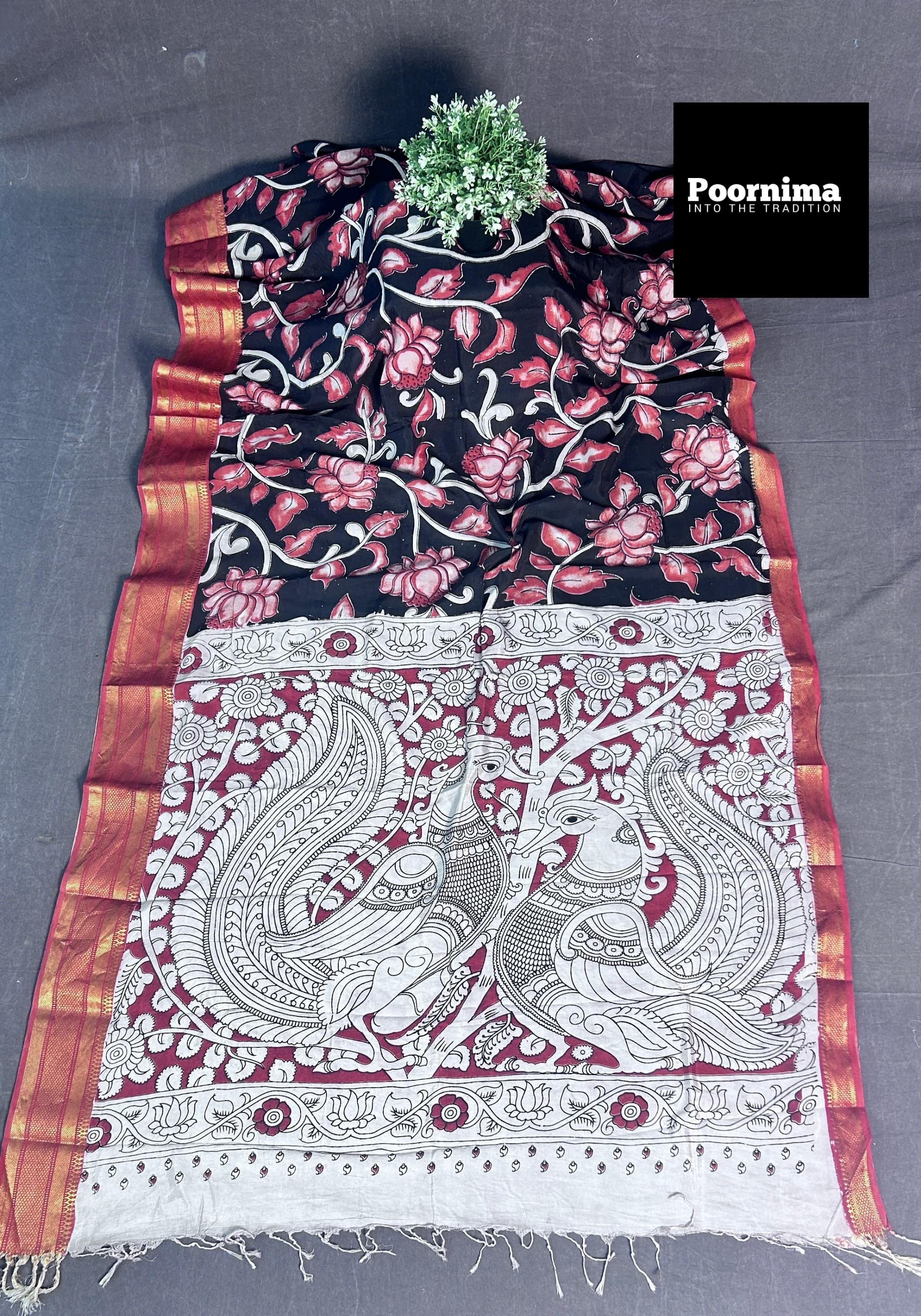 BLACK AND LIGHT RED COMBINATION WITH COLUMAKARY PRINTS WITH GOLD KANCHI BORDER