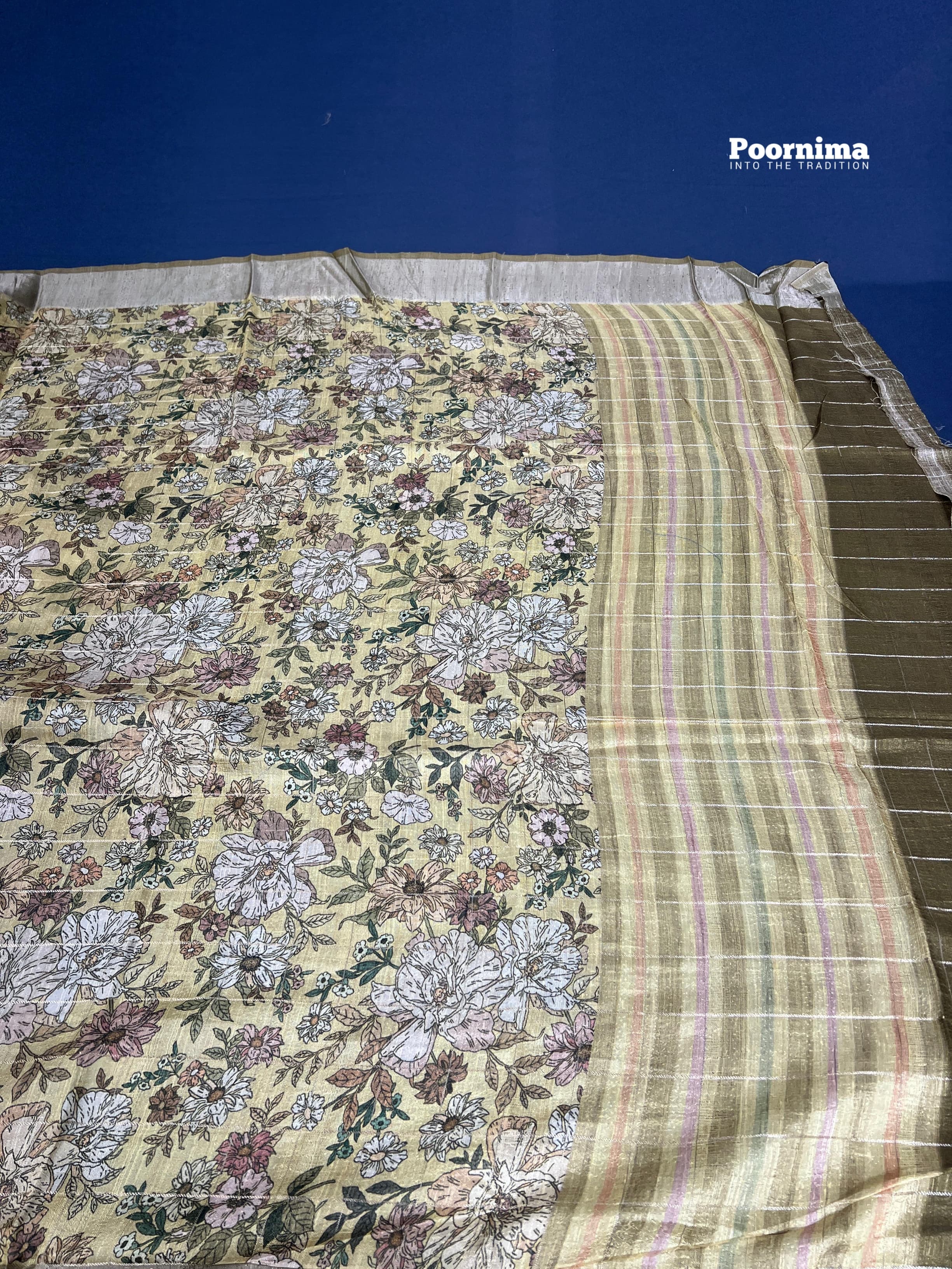 THUSSER WITH ALL OVER SAREE WITH FLOWERS DESIGHN LIGHT YELOOW COLUR