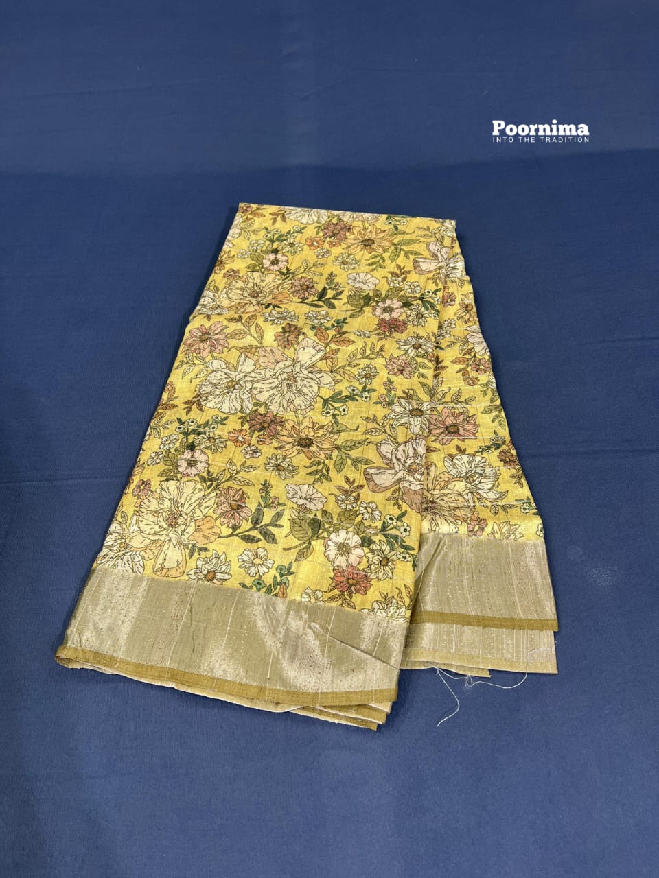 THUSSER WITH ALL OVER SAREE WITH FLOWERS DESIGHN LIGHT YELOOW COLUR