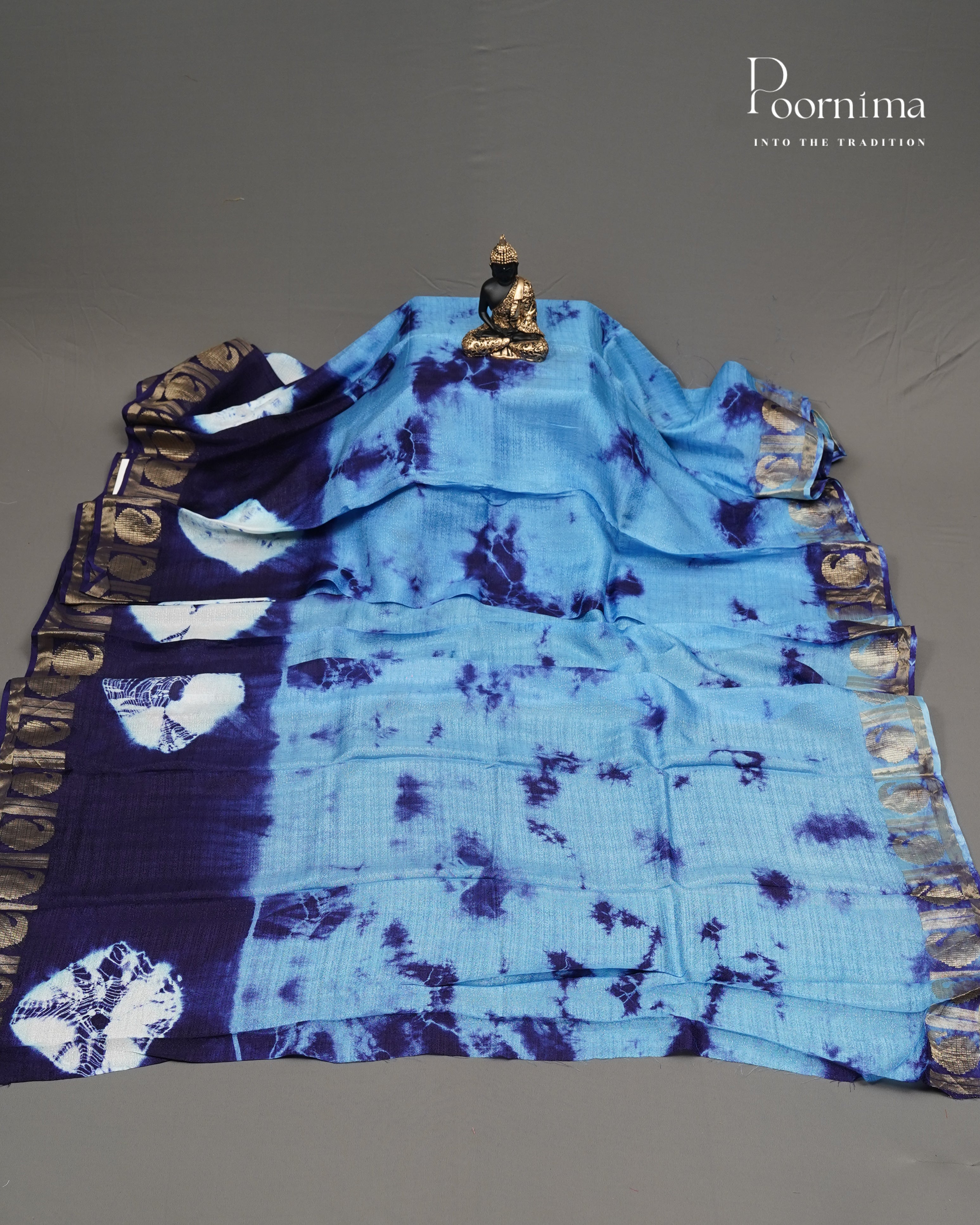 JUTE GEORGETTE SAREE WITH ALLOVER TIE-DYE DESIGN AND GOLD ZARI BORDER