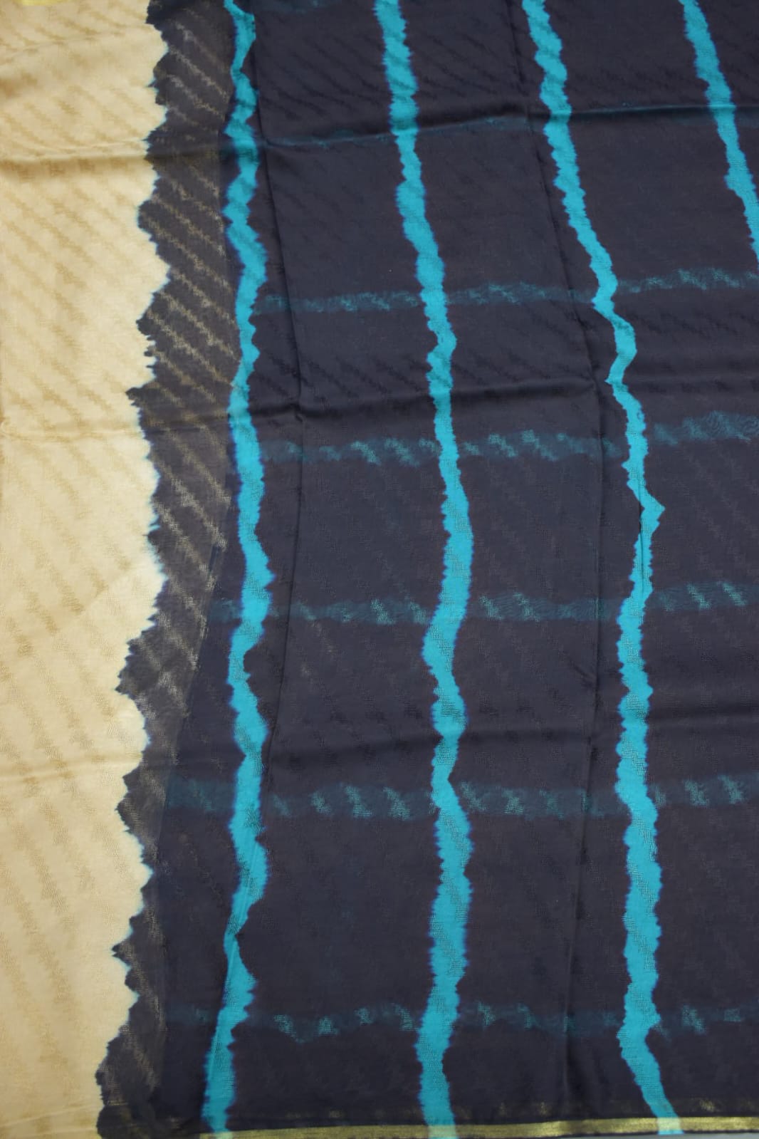 CREAM-GEORGETTE SAREER WITH SHIOBORI TIE & DIE