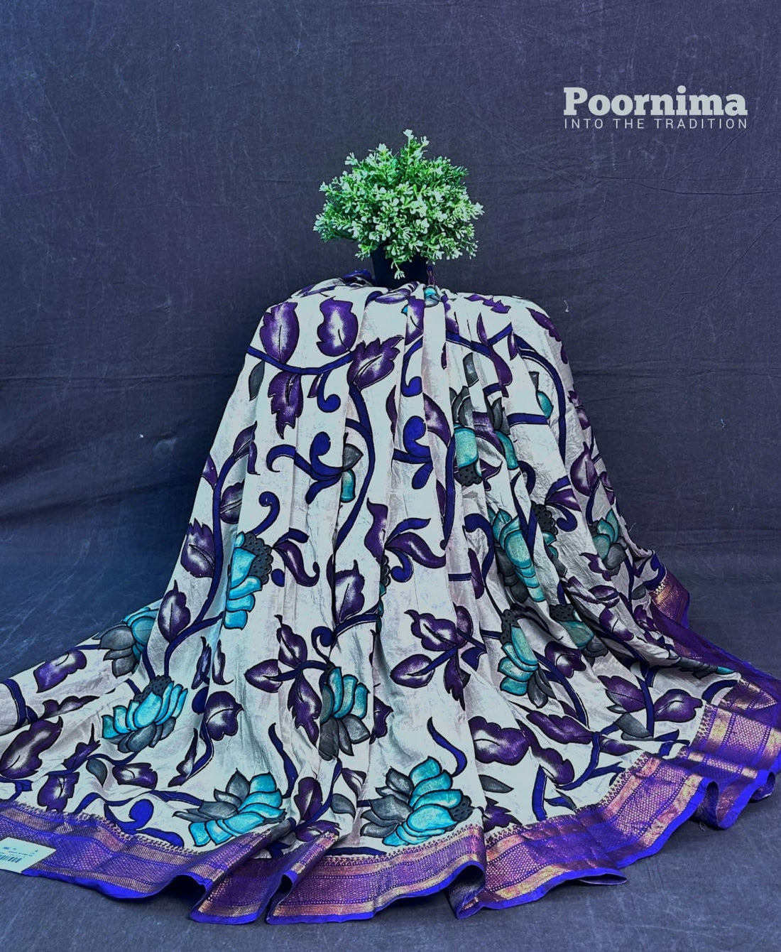 PURPULE WITH SEE GREEN FLOWES AND PURPULE BORDER KALAMKARI PRINTS