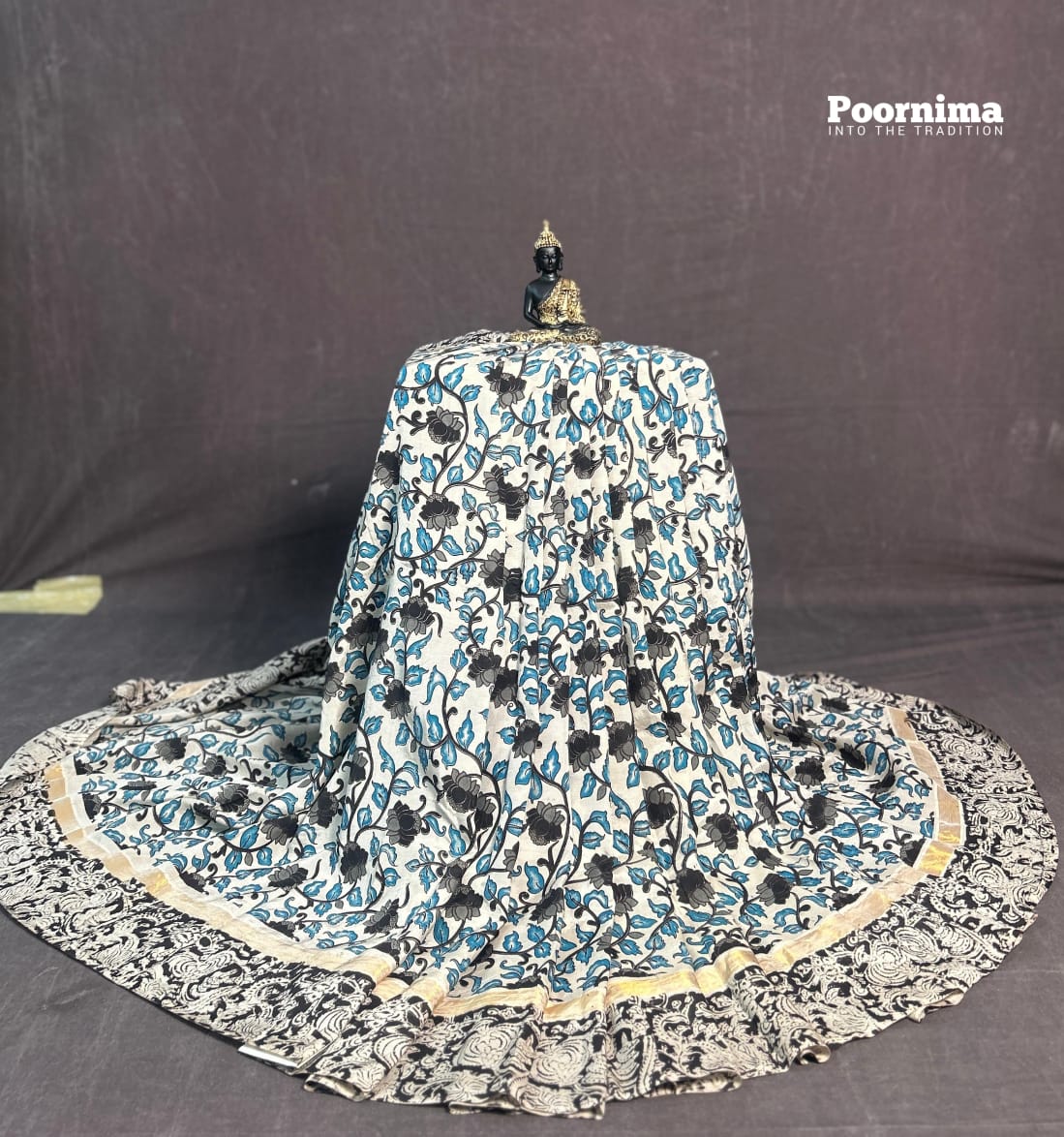 GAJI SILK WITH SMALL GOLD BORDER WITH BLACK AND BLUE COMBINATION WITH CREAM COLOUR BODY