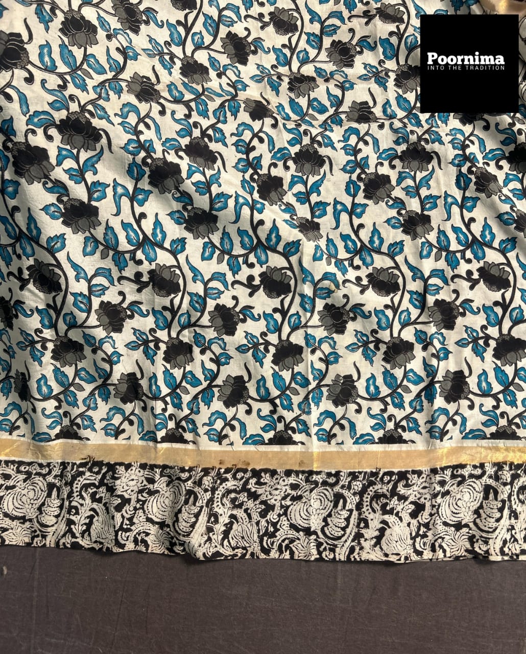 GAJI SILK WITH SMALL GOLD BORDER WITH BLACK AND BLUE COMBINATION WITH CREAM COLOUR BODY