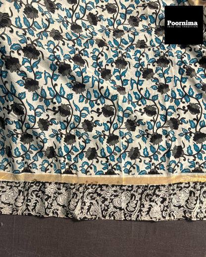 GAJI SILK WITH SMALL GOLD BORDER WITH BLACK AND BLUE COMBINATION WITH CREAM COLOUR BODY