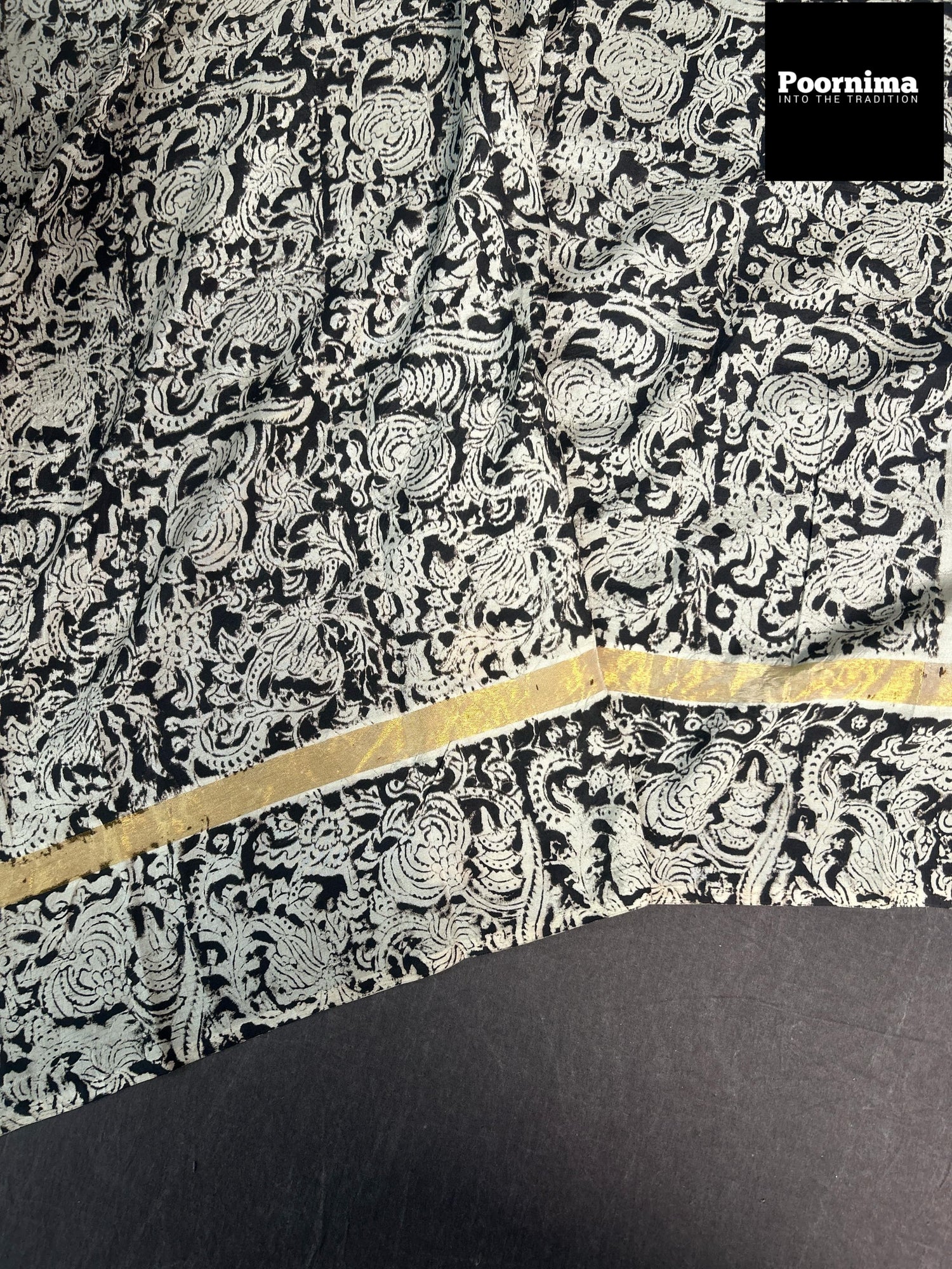 GAJI SILK WITH SMALL GOLD BORDER WITH BLACK AND BLUE COMBINATION WITH CREAM COLOUR BODY
