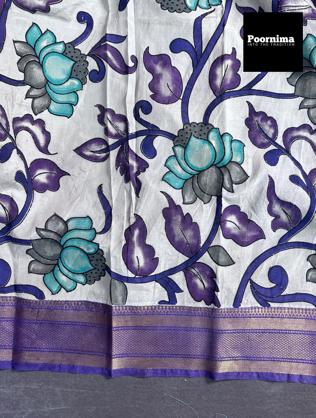 PURPULE WITH SEE GREEN FLOWES AND PURPULE BORDER KALAMKARI PRINTS