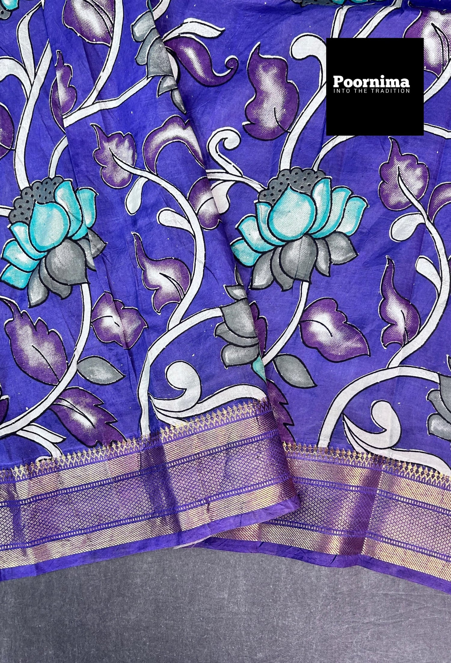 PURPULE WITH SEE GREEN FLOWES AND PURPULE BORDER KALAMKARI PRINTS