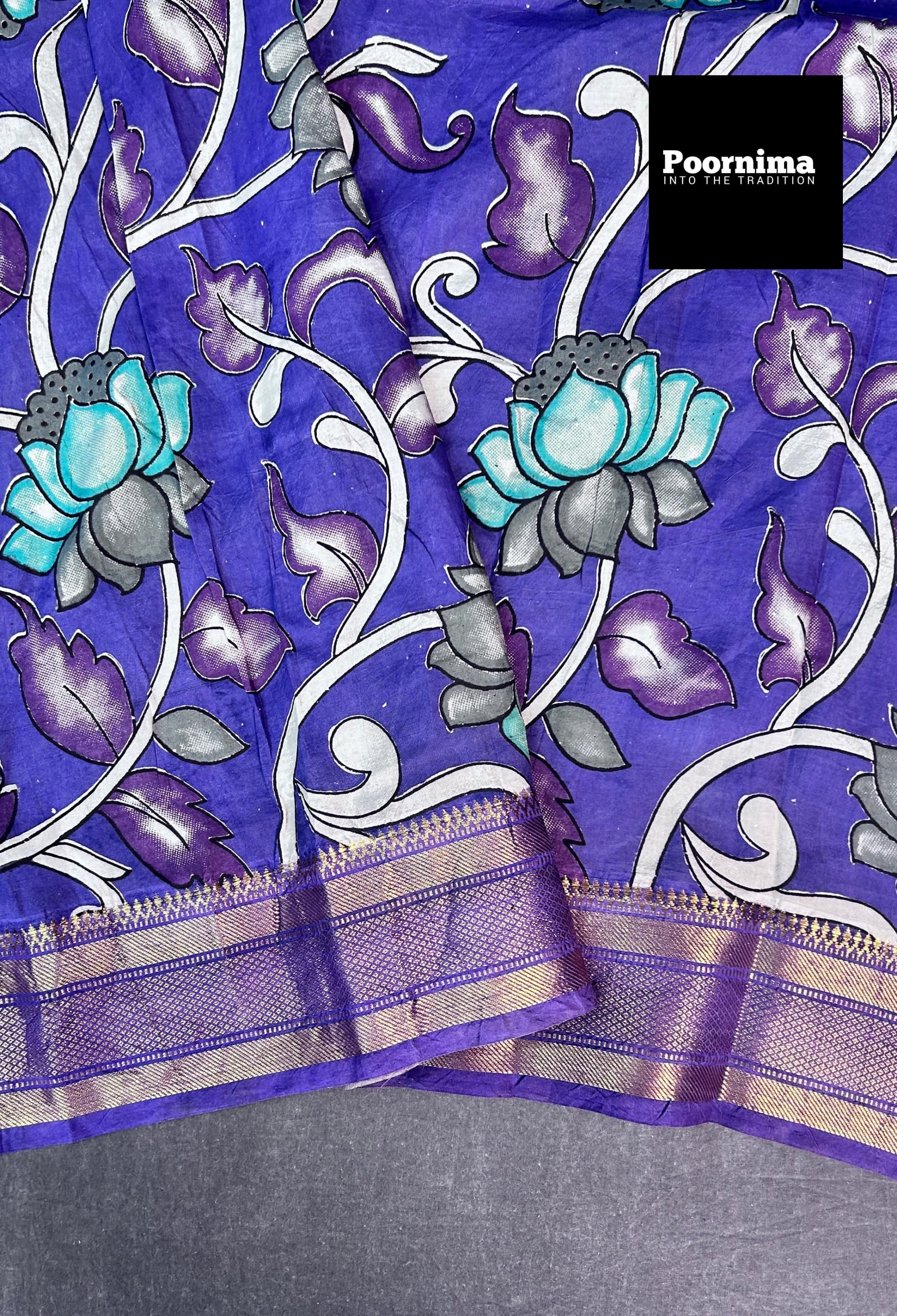 PURPULE WITH SEE GREEN FLOWES AND PURPULE BORDER KALAMKARI PRINTS