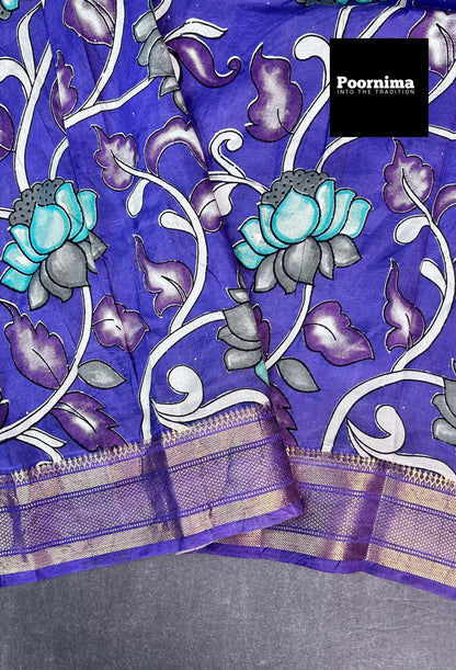 PURPULE WITH SEE GREEN FLOWES AND PURPULE BORDER KALAMKARI PRINTS