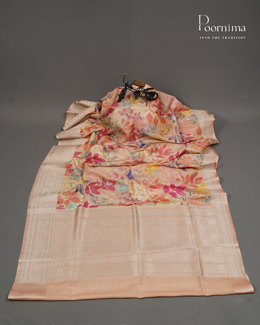 Pure Katan Pattu with digital printing and Zari Woven Border in light Peach colour