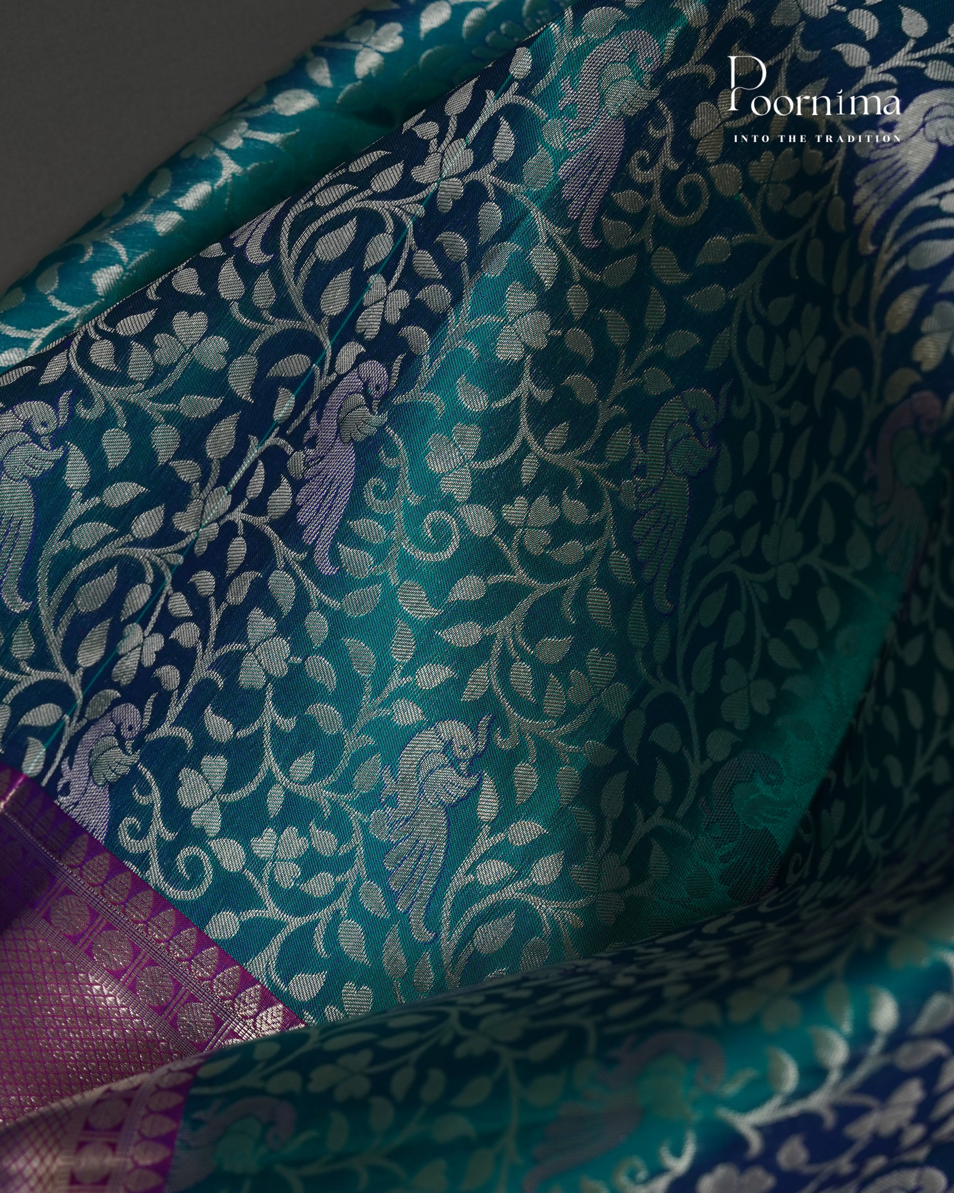 PURE KANJIVARAM SILK SAREE IN GREEN AND PURPLE  COMBINATION WITH ALLOVER SILVER ZARI WOVEN