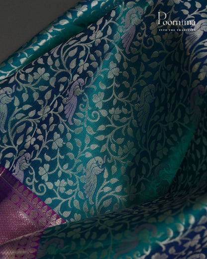 PURE KANJIVARAM SILK SAREE IN GREEN AND PURPLE  COMBINATION WITH ALLOVER SILVER ZARI WOVEN