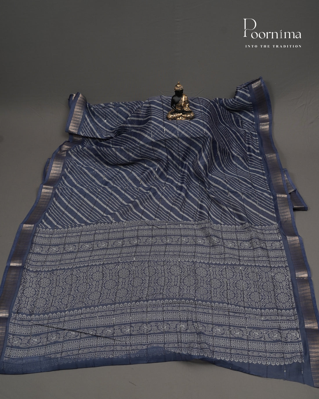 BLUE - SEMI CREPE SAREE WITH LINES DISCHARGE PRINT, SEQUINS WORK & TEMPLE PATTERN ZARI BORDER