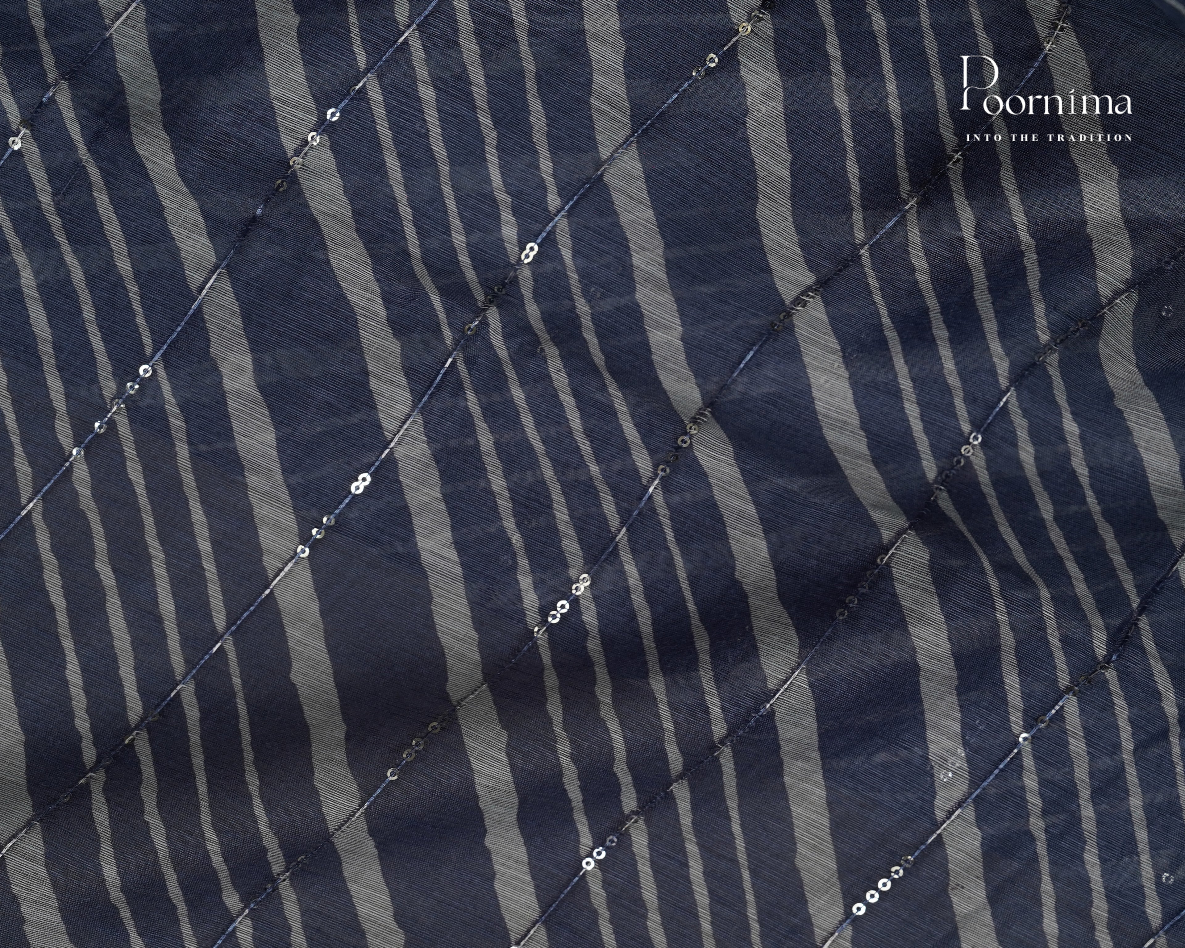 BLUE - SEMI CREPE SAREE WITH LINES DISCHARGE PRINT, SEQUINS WORK &amp; TEMPLE PATTERN ZARI BORDER