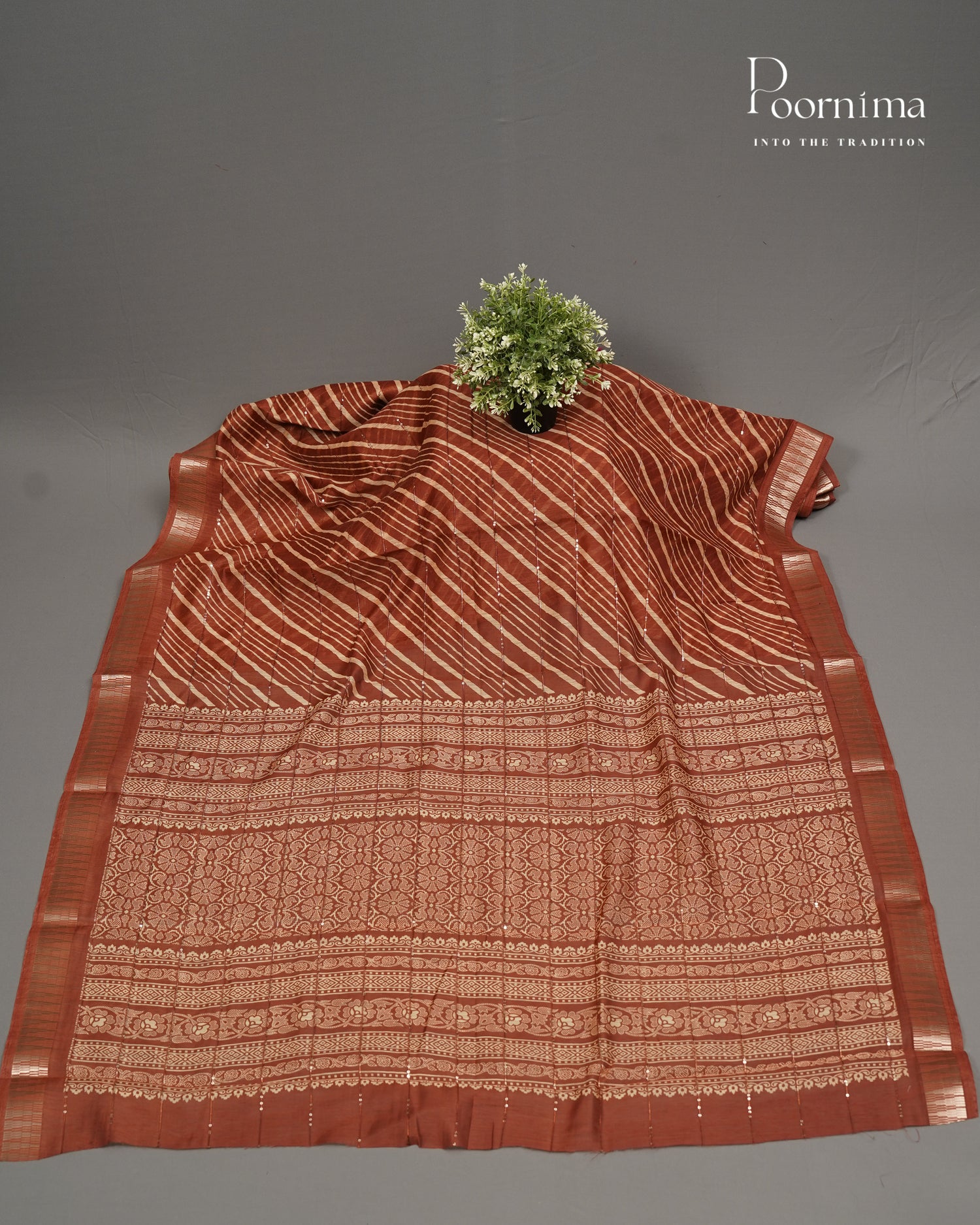 RUST ORANGE- SEMI CREPE SAREE WITH LINES DISCHARGE PRINT, SEQUINS WORK &amp; TEMPLE PATTERN ZARI BORDER