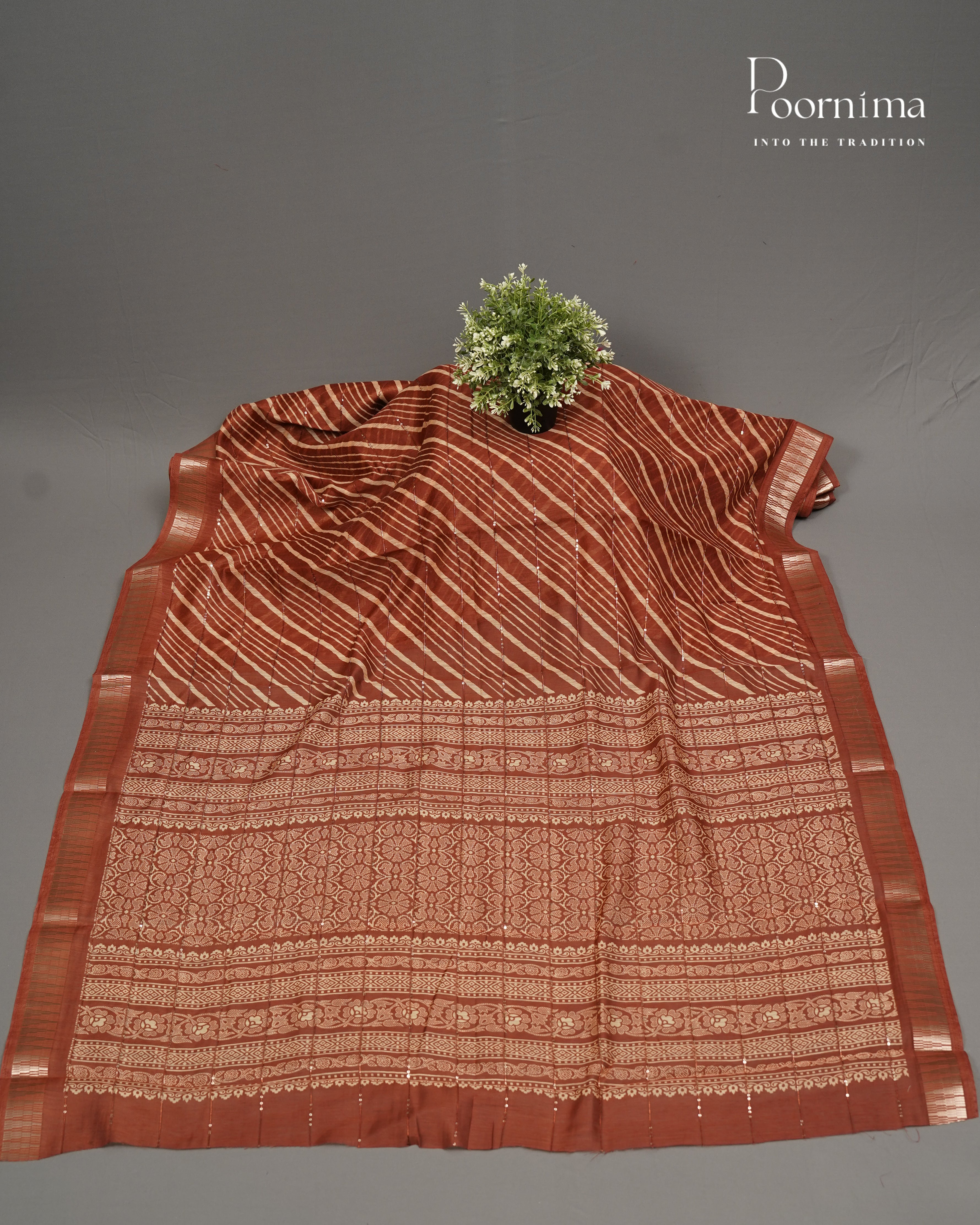 RUST ORANGE- SEMI CREPE SAREE WITH LINES DISCHARGE PRINT, SEQUINS WORK &amp; TEMPLE PATTERN ZARI BORDER