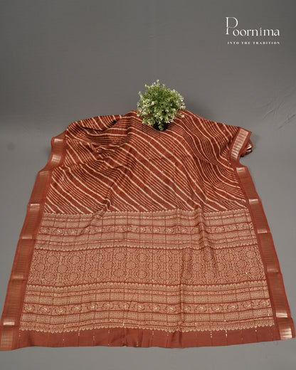 RUST ORANGE- SEMI CREPE SAREE WITH LINES DISCHARGE PRINT, SEQUINS WORK &amp; TEMPLE PATTERN ZARI BORDER