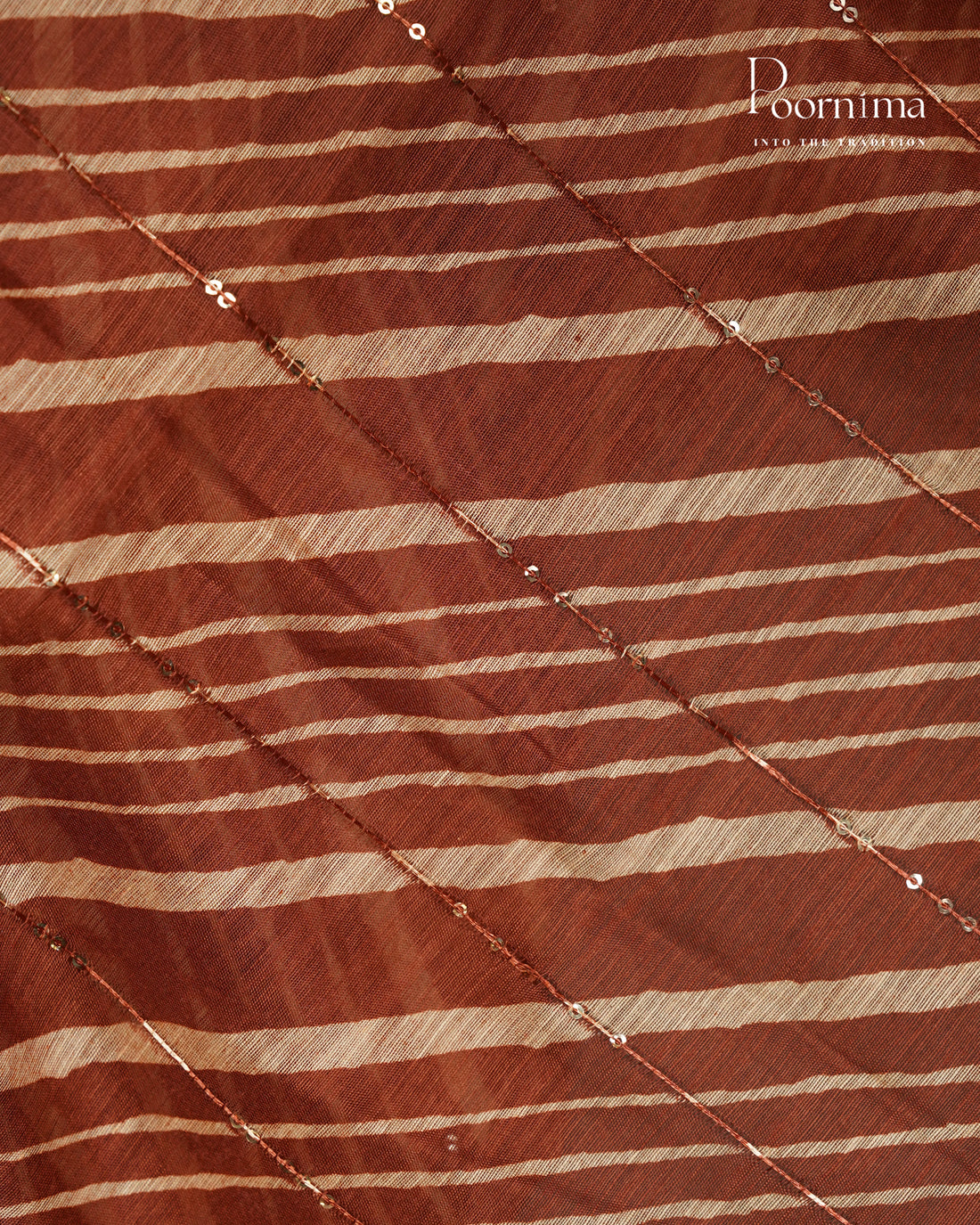 RUST ORANGE- SEMI CREPE SAREE WITH LINES DISCHARGE PRINT, SEQUINS WORK & TEMPLE PATTERN ZARI BORDER