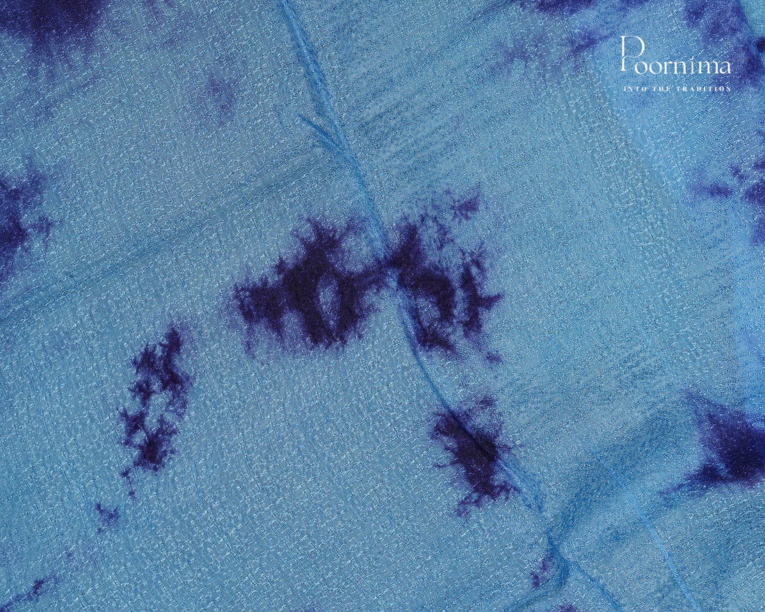 JUTE GEORGETTE SAREE WITH ALLOVER TIE-DYE DESIGN AND GOLD ZARI BORDER