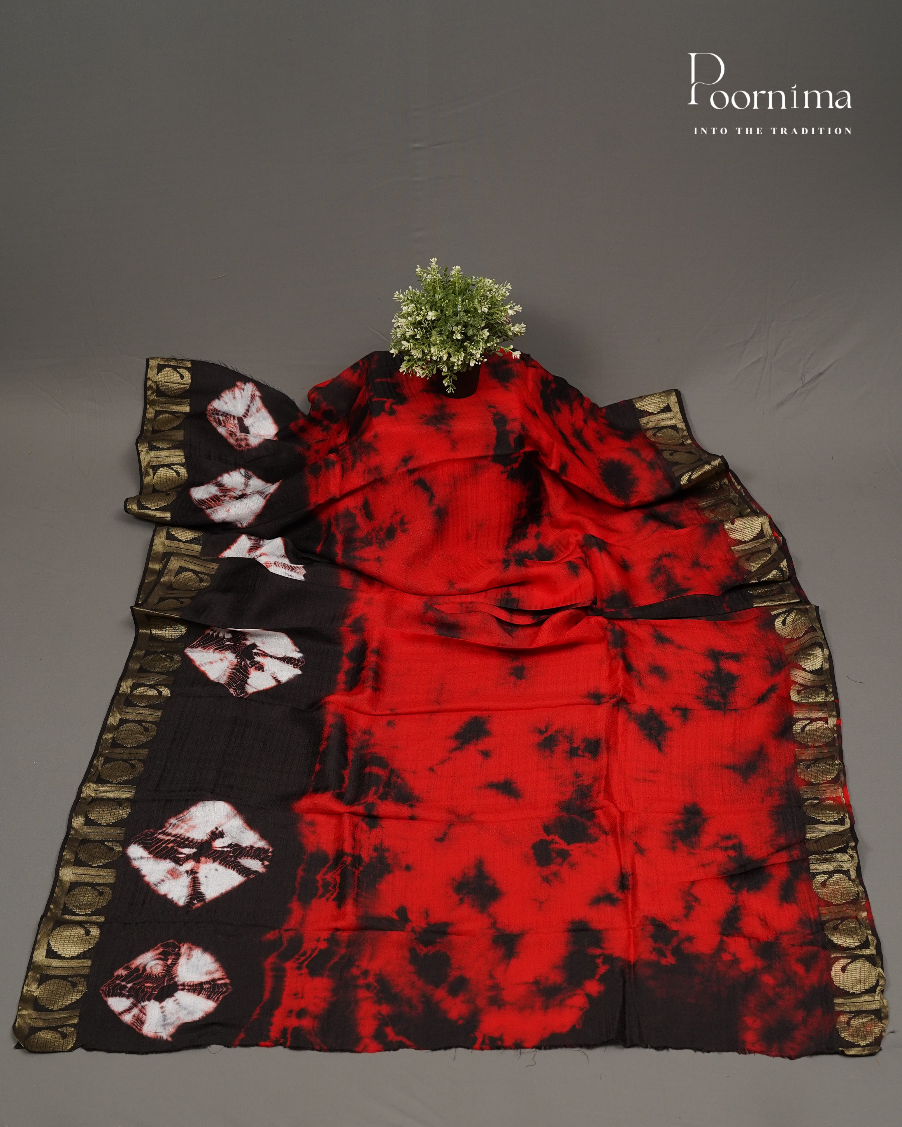 RED &amp; BLACK - JUTE GEORGETTE SAREE WITH ALLOVER TIE-DYE DESIGN AND GOLD ZARI BORDER