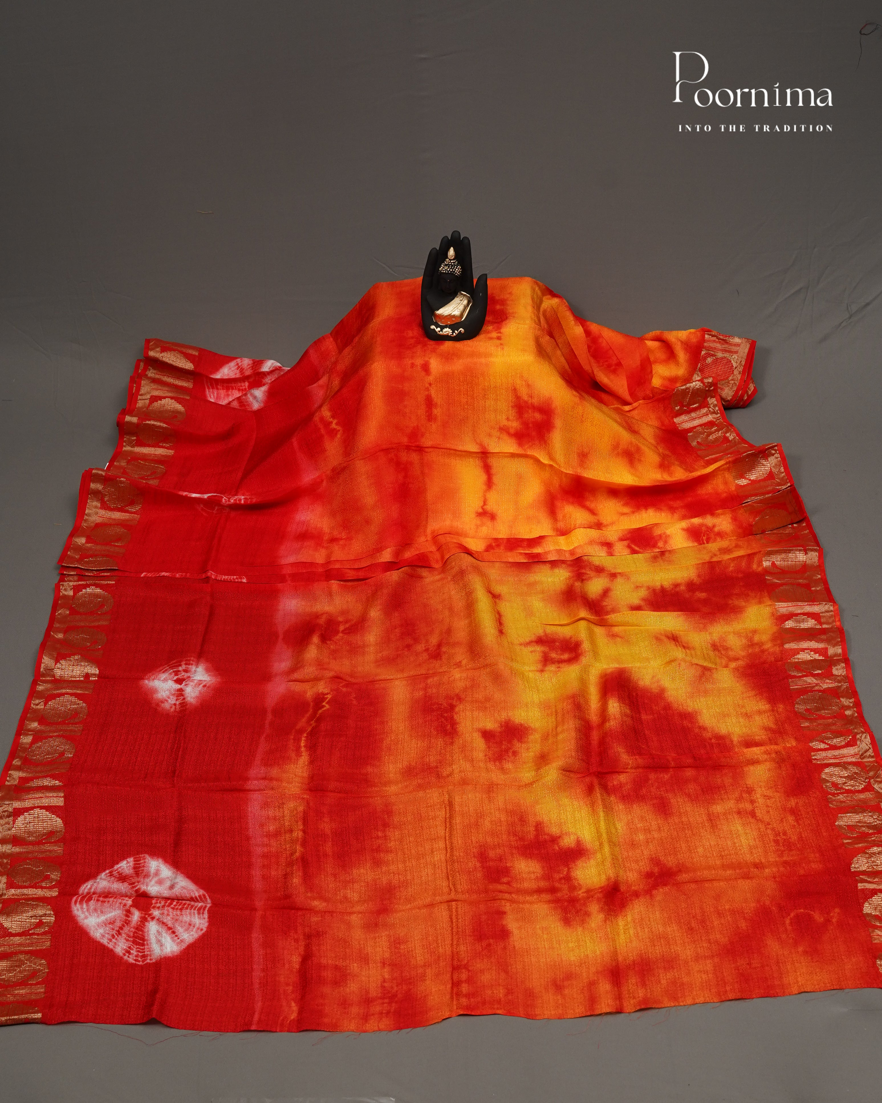 YELLOW &amp; RED - JUTE GEORGETTE SAREE WITH ALLOVER TIE-DYE DESIGN AND GOLD ZARI BORDER