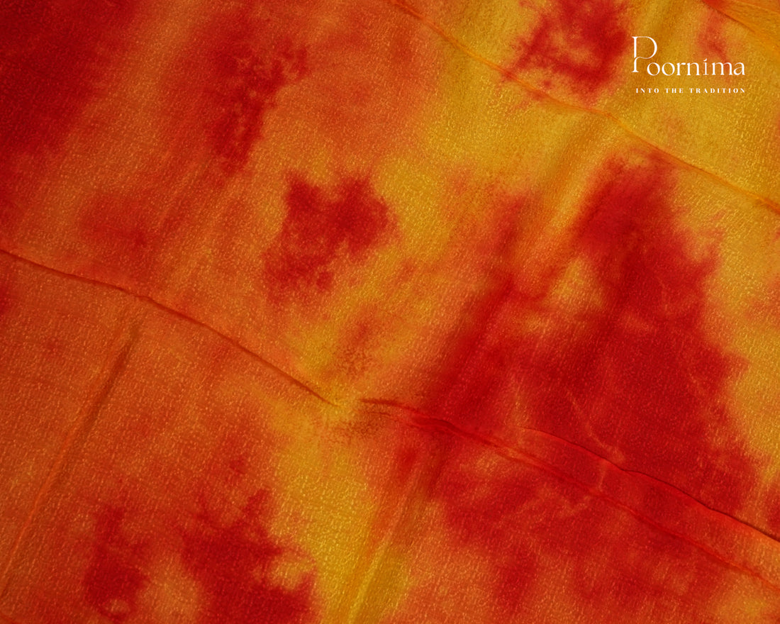 YELLOW & RED - JUTE GEORGETTE SAREE WITH ALLOVER TIE-DYE DESIGN AND GOLD ZARI BORDER