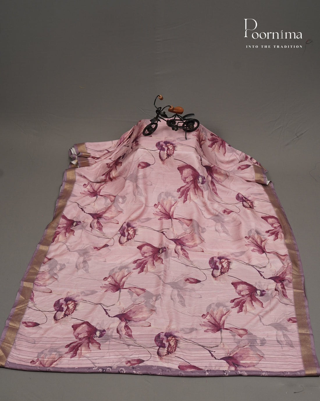 PINK - LINEN SAREE WITH ALLOVER DIGITAL PRINT AND ZARI BORDER