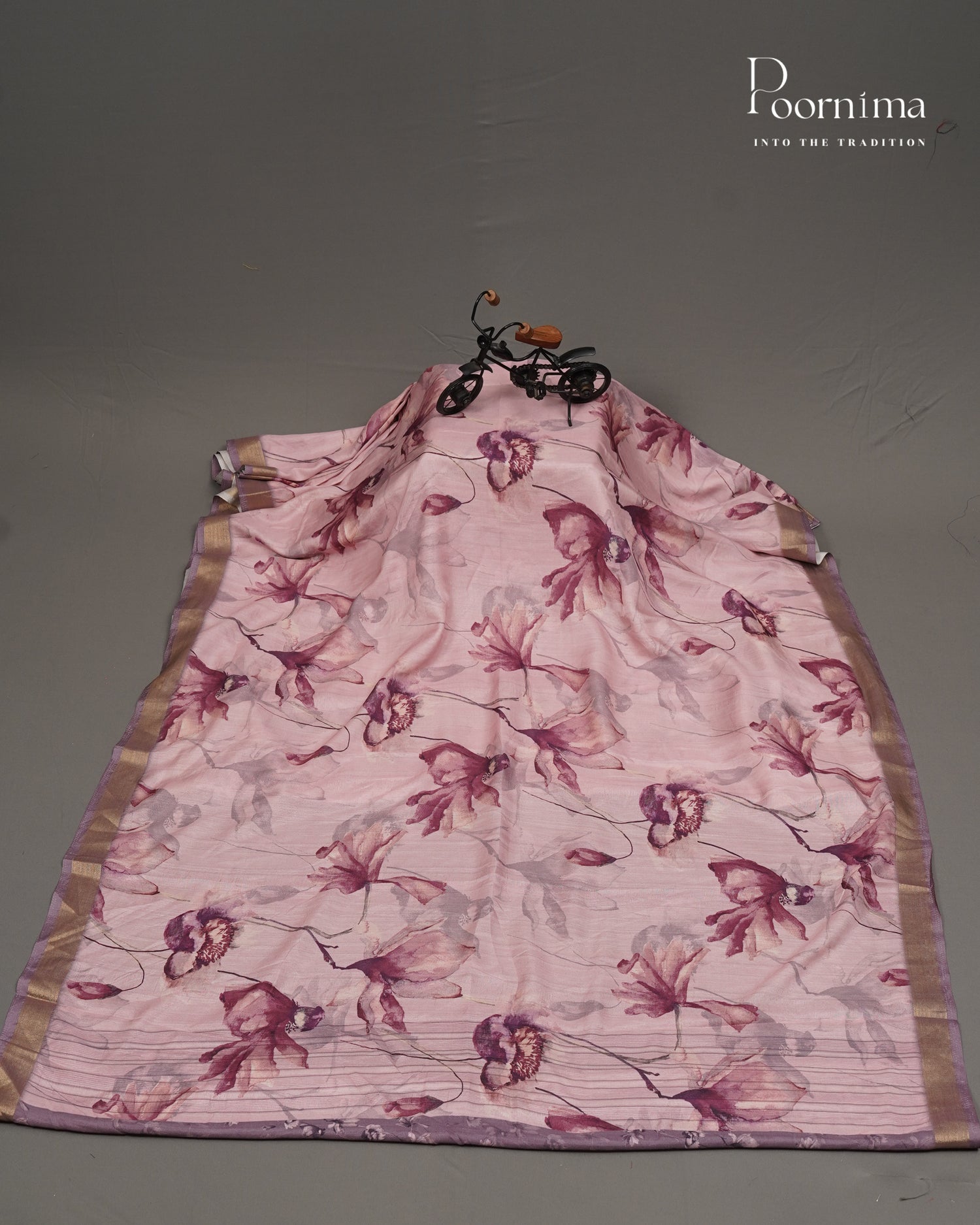 PINK - LINEN SAREE WITH ALLOVER DIGITAL PRINT AND ZARI BORDER